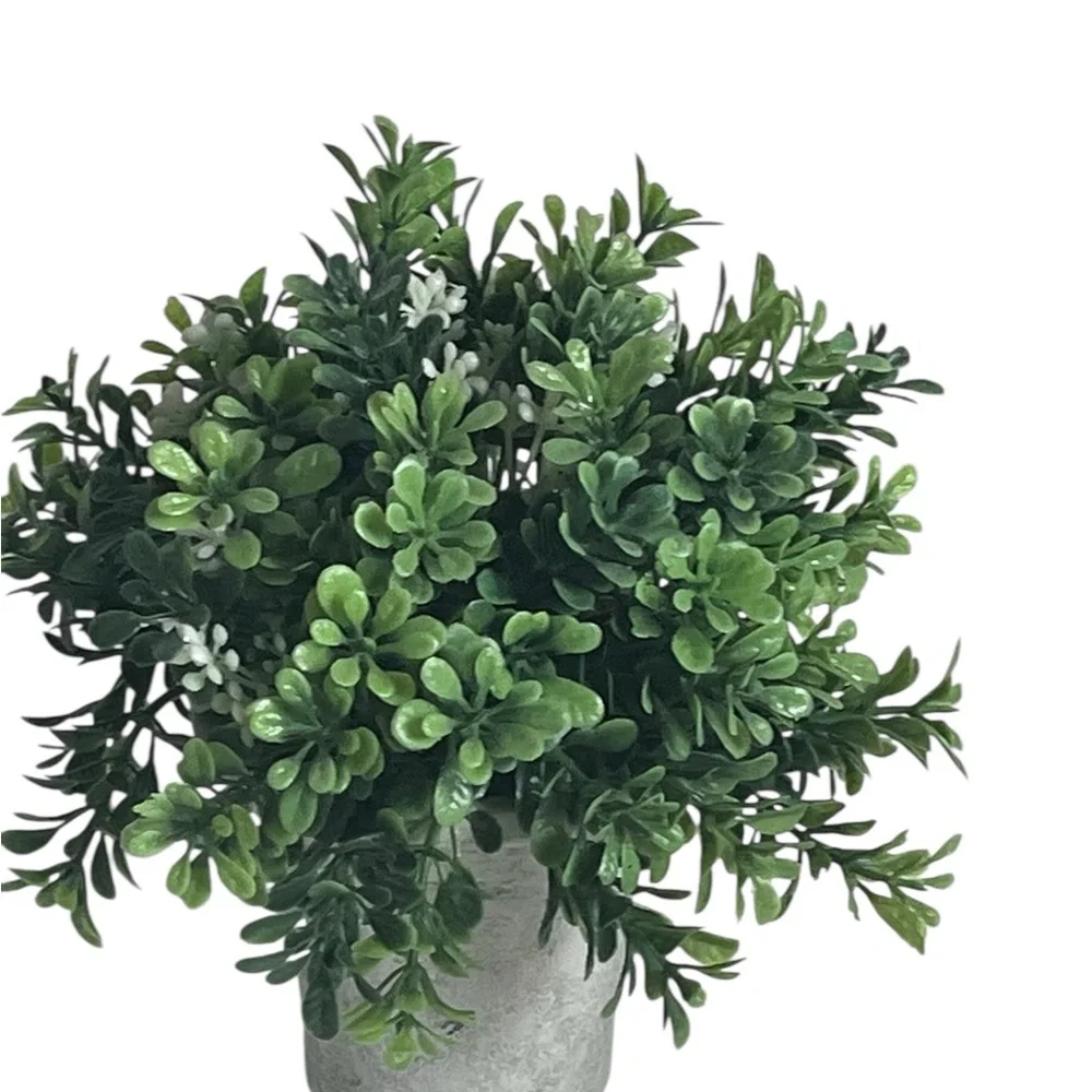 Elegant White Planter with Lush Greenery